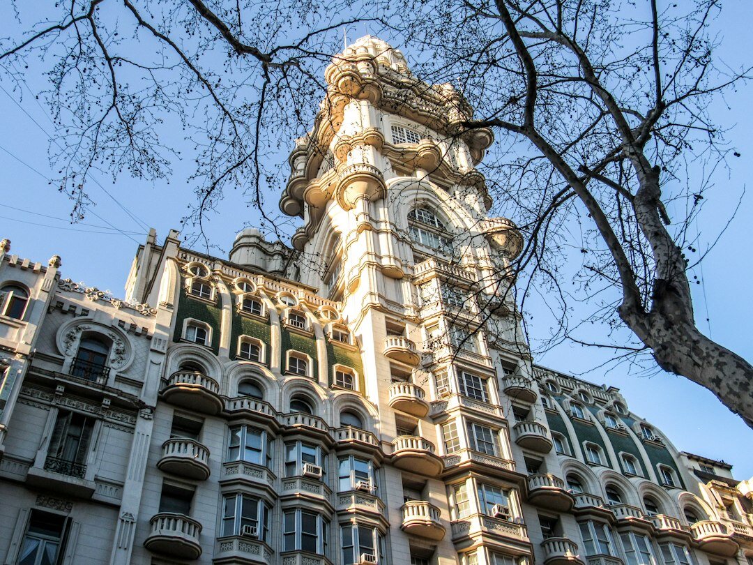 Sedan parked in front of classic Buenos Aires architecture