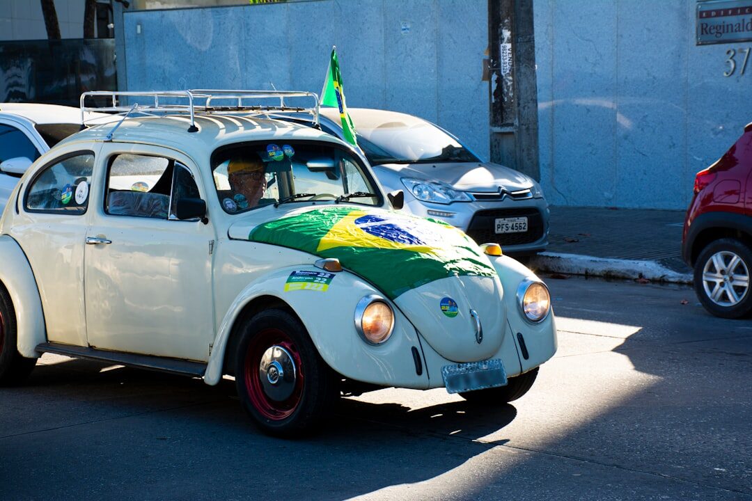 Modern SUV parked on a tropical Brazilian coastal avenue